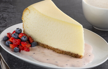 Cheesecake with Vanilla Sauce & Fresh Berries